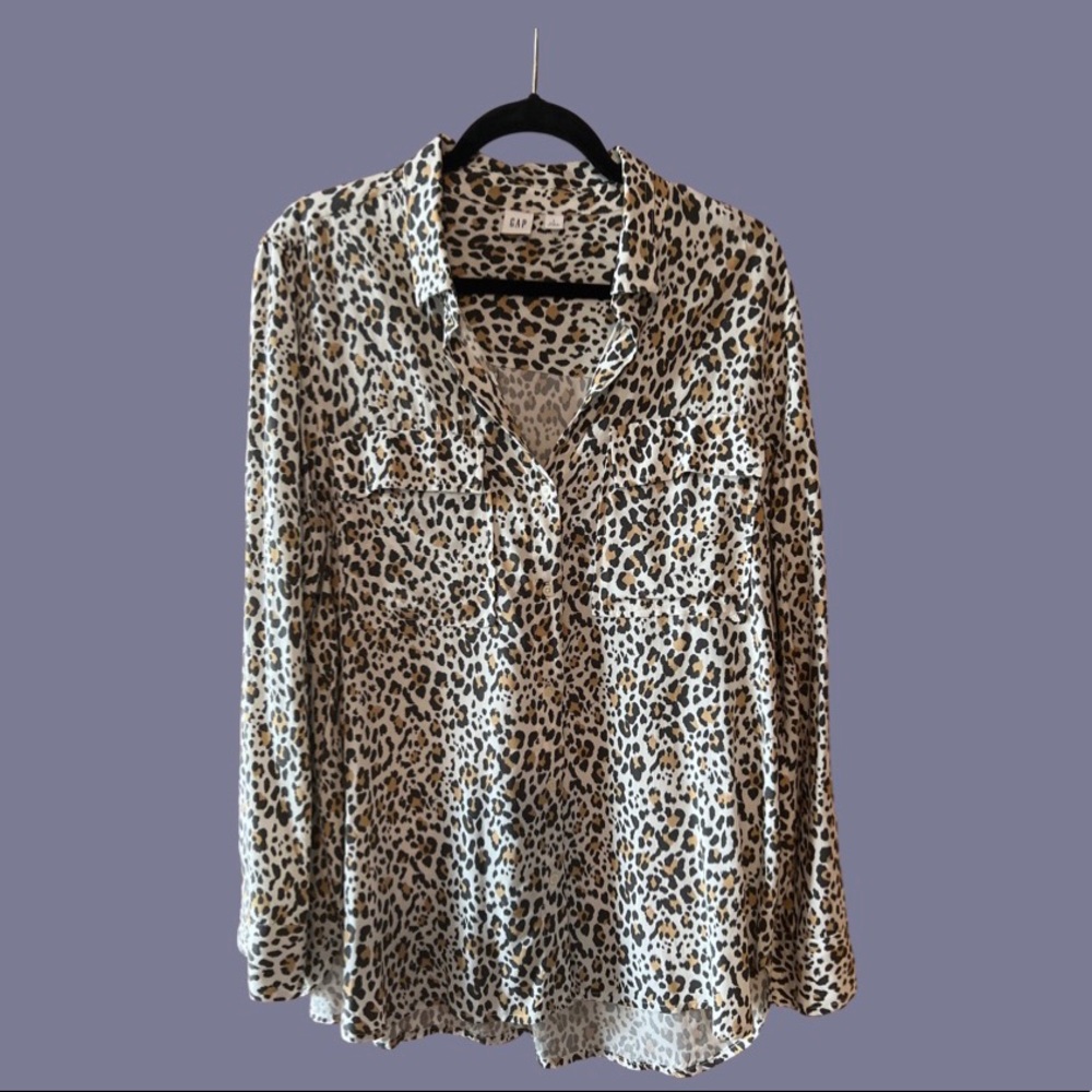 Cheetah print button down.  Long fit.   Great with leggings.